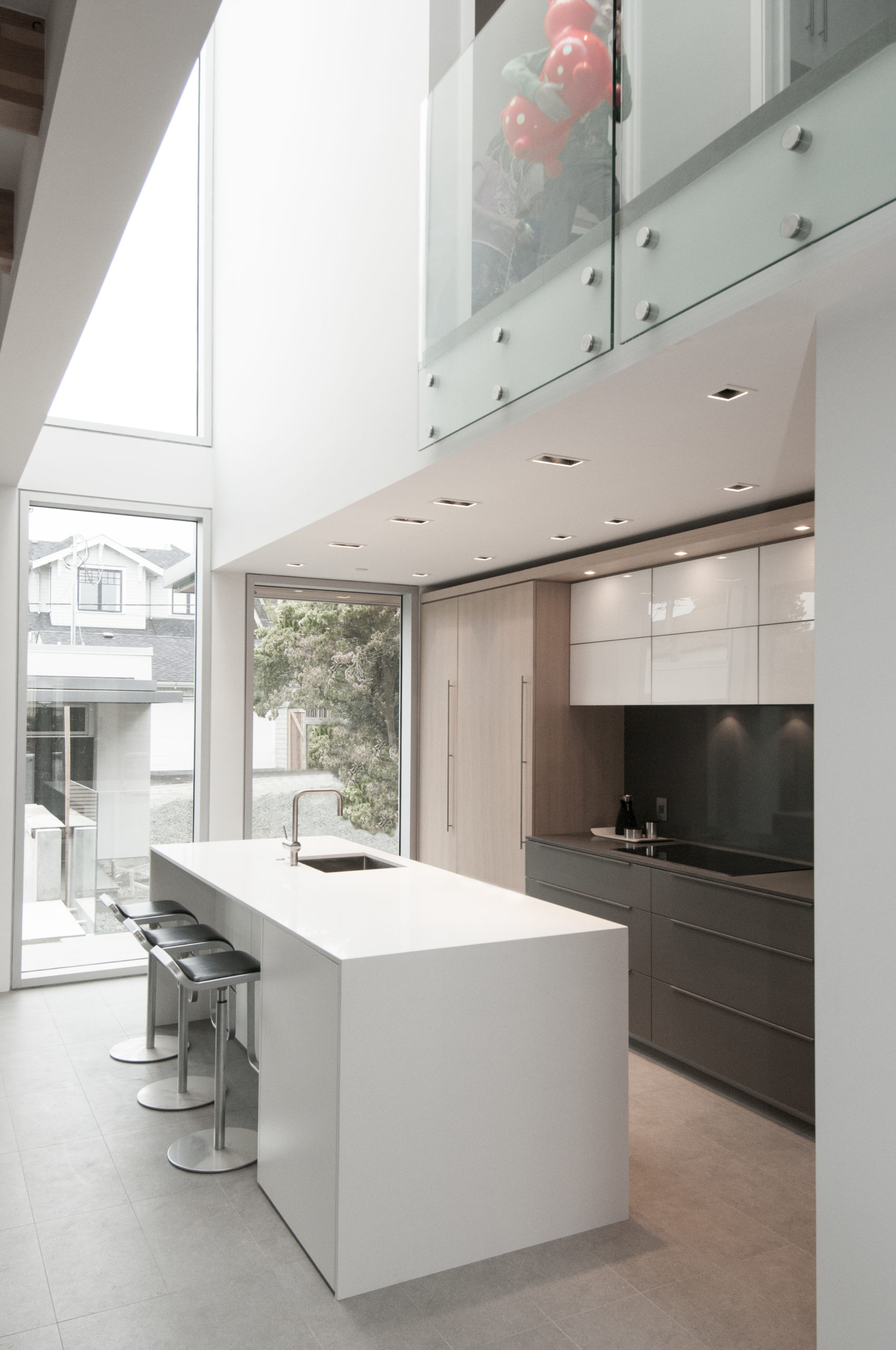 Kitchen with a clean and modern design at a Vancouver custom home.