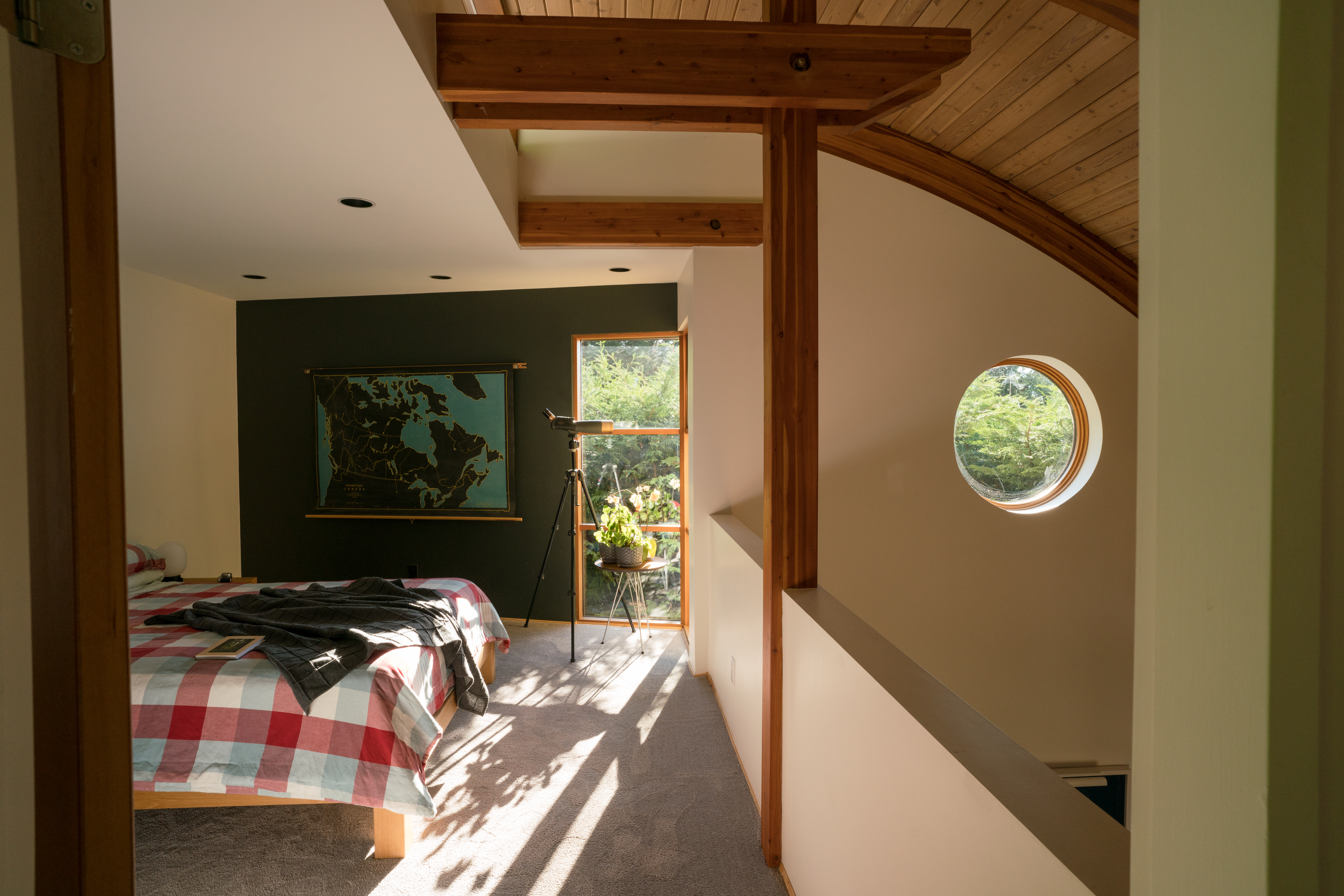 Bedroom design with wooden details at a custom home on Bowen Island.
