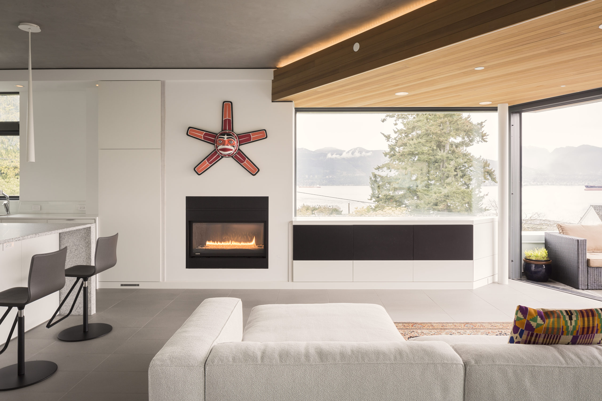 Modern design of a living rooom at a custom home in Spanish Banks.