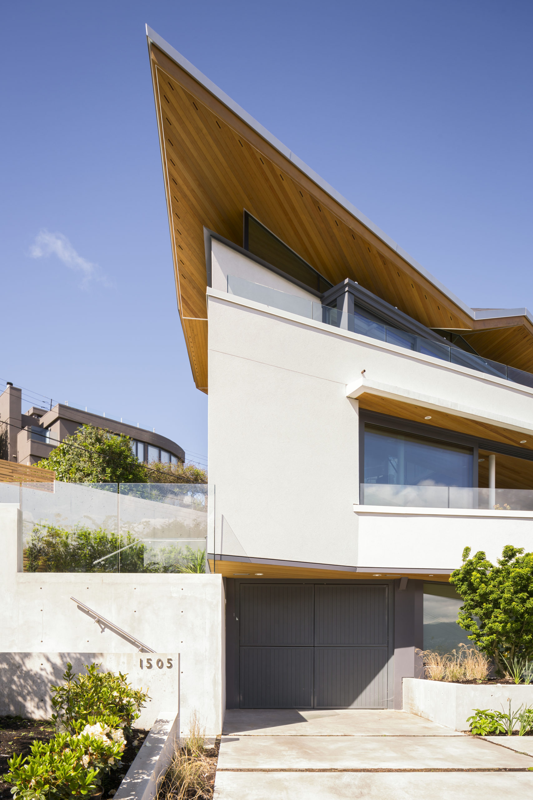 Front view of a modern home design in Spanish Banks.