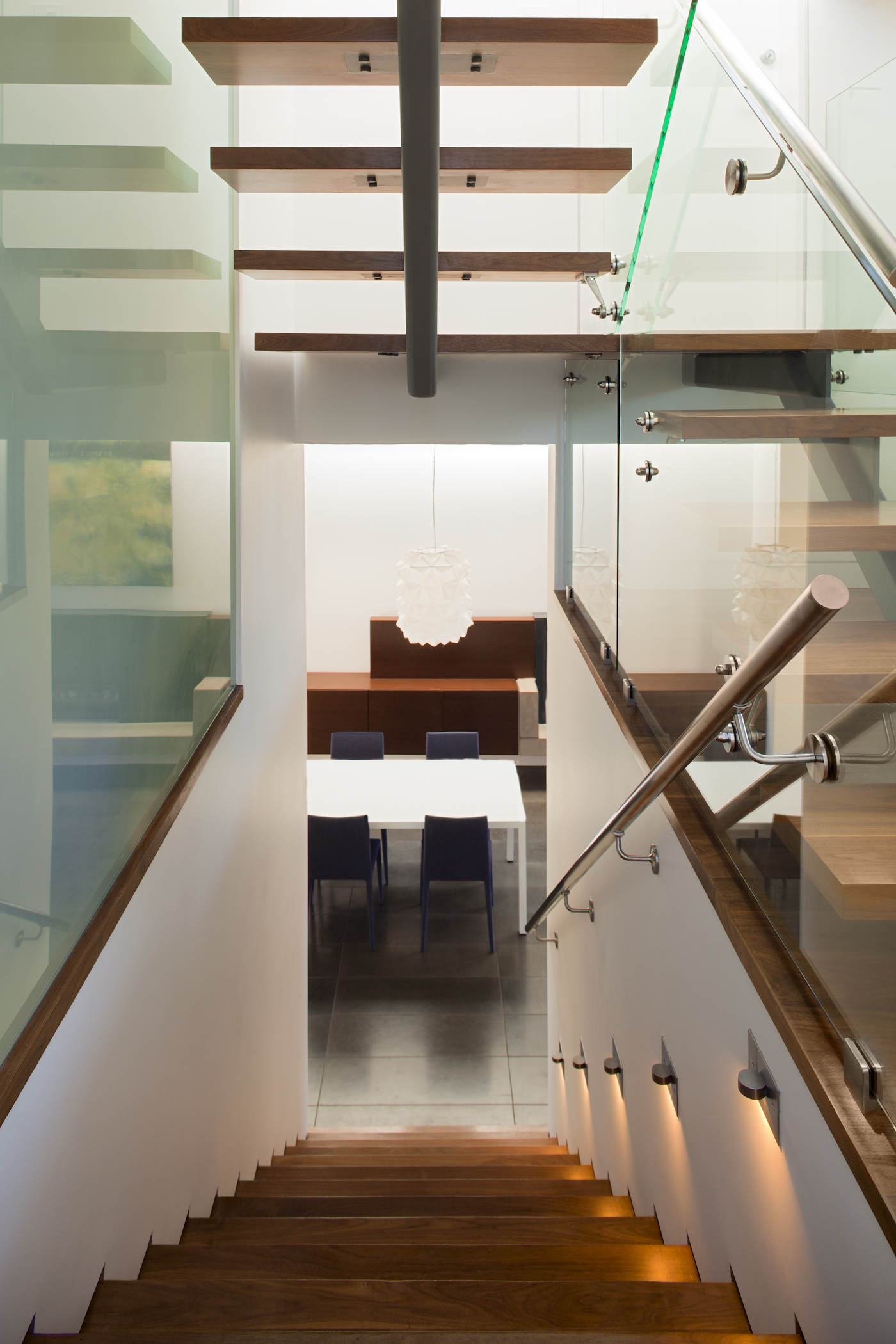 Stairs with wooden and steel details at a custom home in Vancouver.