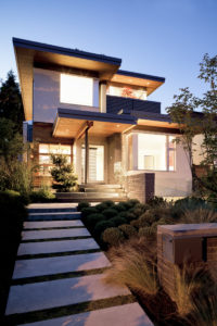 Front view of a custom home with a sustainable and modern design in Vancouver.
