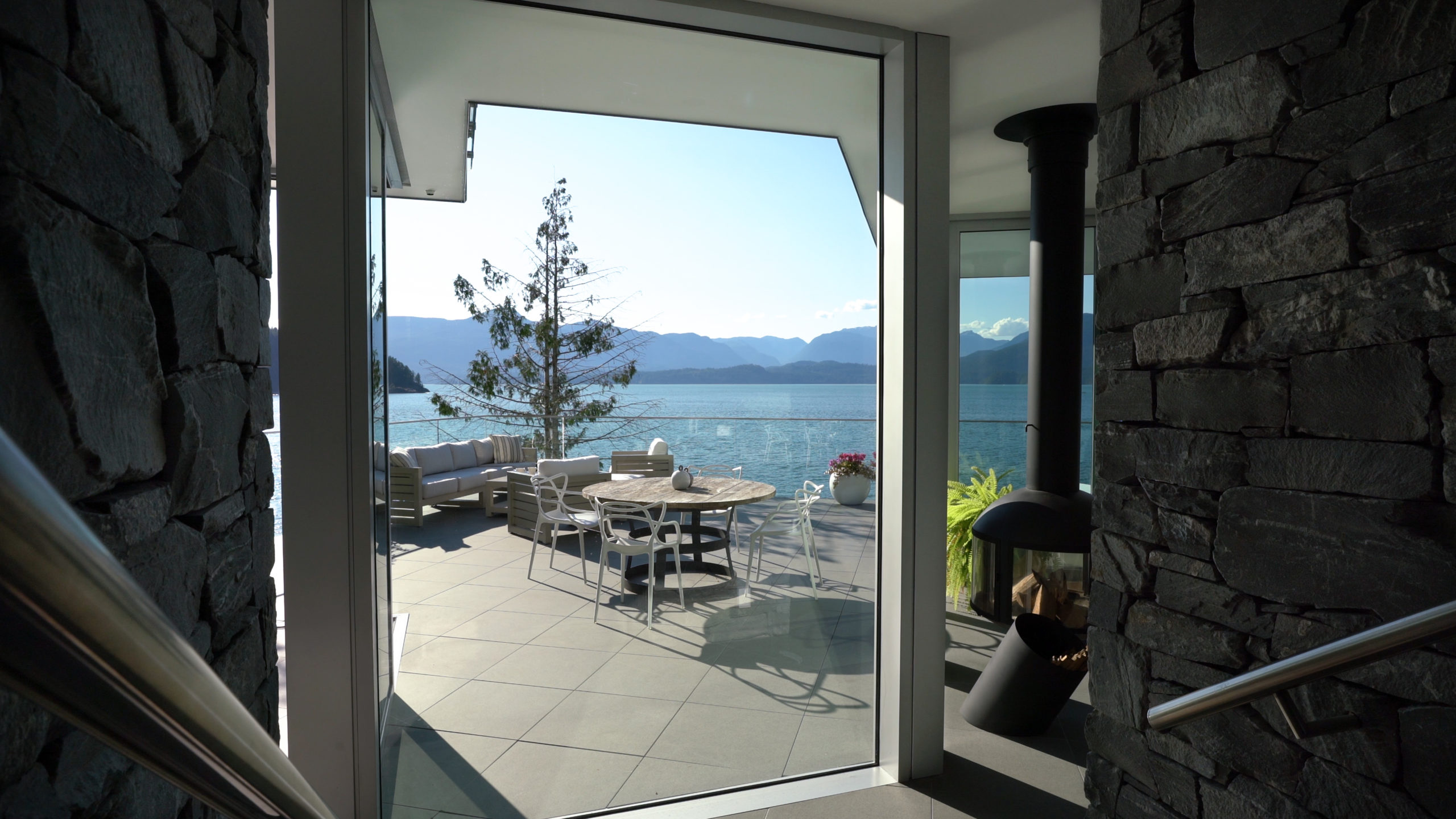 Backyard design with ocean view in a luxurious custom residence on Bowen Island.